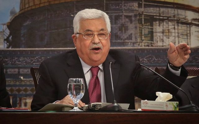 Abbas declares Israeli legislation won’t stop him from paying terrorists