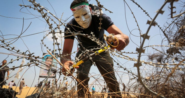 15,000 Palestinian rioters ‘sabotage humanitarian efforts’ on Gaza border