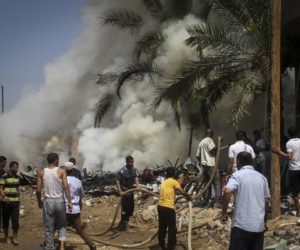 Palestinians gather at the site of an explosion that ripped through a house in the Al-Shabura refugee camp near the southern Gaza Strip town of Rafah on August 6, 2015. An explosion killed four Palestinians and wounded 30 on Thursday in the southern Gaza town of Rafah along the Egyptian border, medical officials and local residents said. Media outlets of the Hamas Islamist group that controls the Gaza Strip blamed the blast on an unexploded Israeli missile from last year's war. The Hamas-run Interior Ministry said it was checking the cause of the explosion, which destroyed the home of Ayman Abu Nqeira, a Hamas member. Photo by Abed Rahim Khatib/ Flash90
