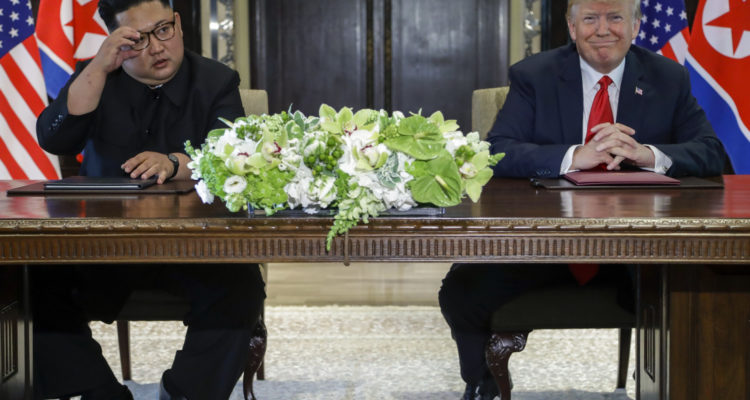 Trump, Kim sign unspecified document, end summit with lofty promises