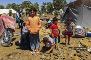 Syrians who fled to safety near Israel's border. (Nabaa Media, via AP)