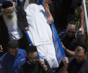 Terror victim Yotam Ovadia's funeral in Jerusalem. (AP Photo/Sebastian Scheiner)