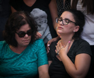The widow (R) of 31-year-old terror victim Yotam Ovadia. (Yonatan Sindel/Flash90)