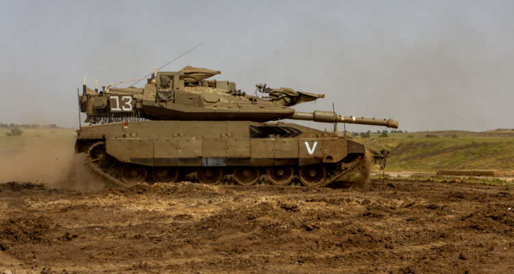 IDF tanks confront suspects on Syrian border
