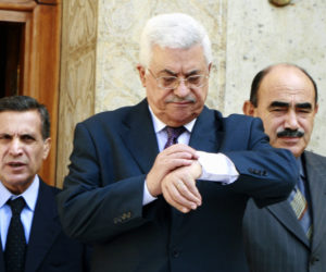 Mahmoud Abbas (C) with recent deputy PB appointee Nabil Abu Rudeina (L), and envoy Munther al-Dajani. (AP Photo/Amr Nabil)