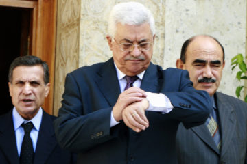 Mahmoud Abbas (C) with recent deputy PB appointee Nabil Abu Rudeina (L), and envoy Munther al-Dajani. (AP Photo/Amr Nabil)