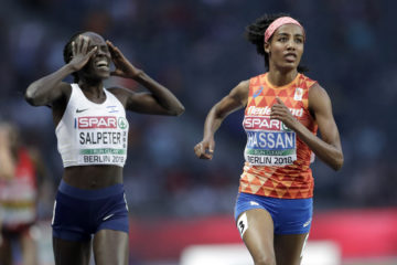 Israel's Lonah Chemtai Salpeter, left, after realizing there was one more lap to go. (AP Photo/Michael Sohn)