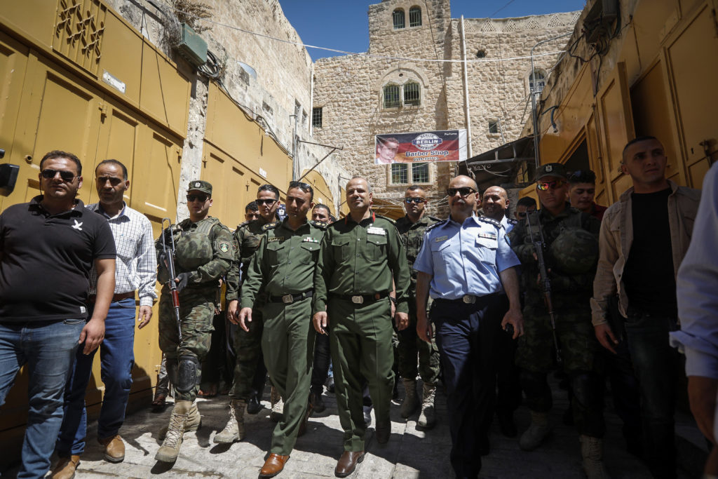 Palestinian security forces in Hebron. (Wisam Hashlamoun/Flash90)