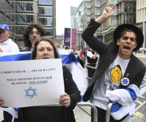 Activists react to Labour's new anti-Semitism definition in London. (Stefan Rousseau/PA via AP)