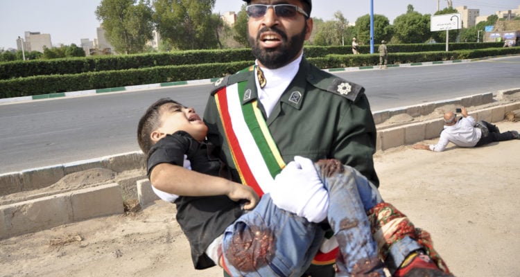 Disguised gunmen massacre at least 29 at Iran military parade