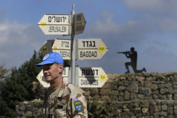 U.N. forces in the Golan Heights. (AP Photo/Tsafrir Abayov)