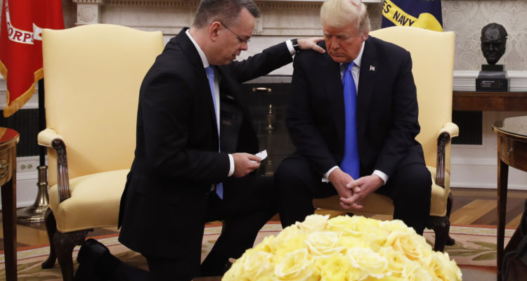 Freed American pastor prays with President Trump