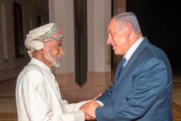 Oman's Sultan Qaboos, left, receives Israeli Benjamin Netanyahu. (Israeli Prime Minister's Office via AP)