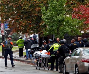 First responders surround the Pittsburgh synagogue where a shooter opened fire. (AP Photo/Gene J. Puskar)