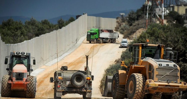 Border buildup: Israel constructs barriers, deploys tanks on Lebanon line
