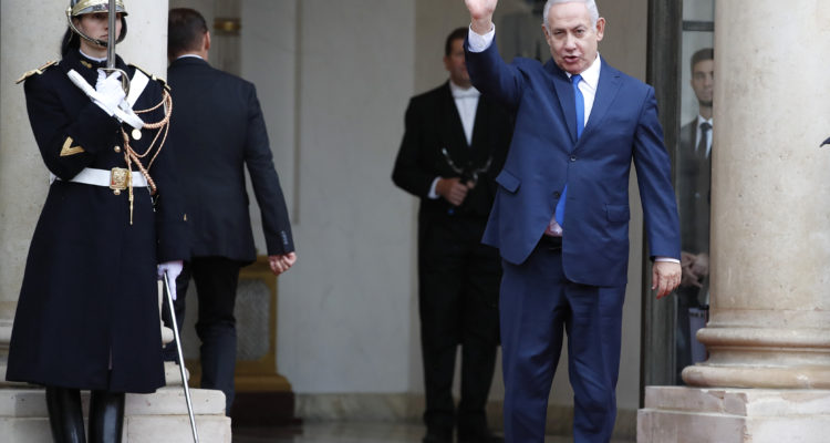 In Paris, Netanyahu defends cash for Gaza, says ‘no diplomatic solution’