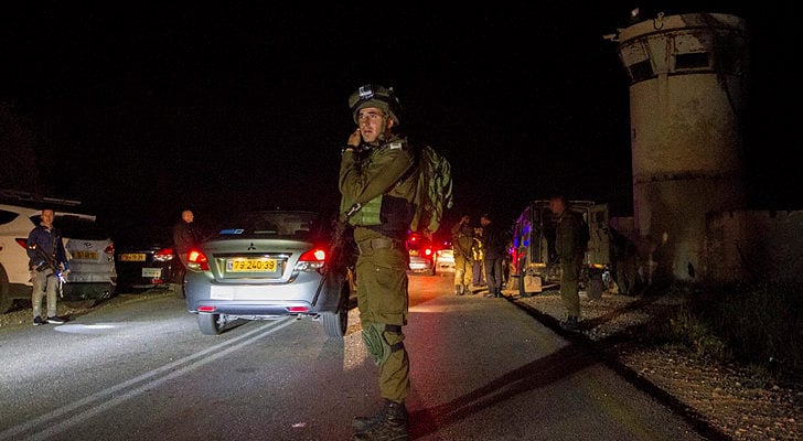 IDF raids Palestinian news agency in hunt for gunmen