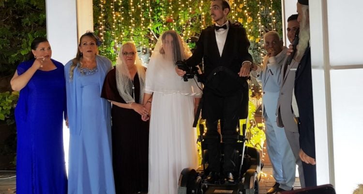 Israeli invention:  Wheelchair-bound groom stands under canopy