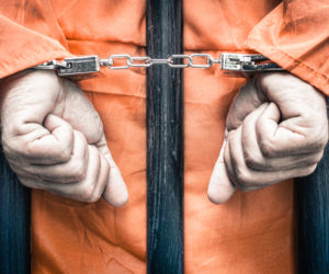 Handcuffed prisoner