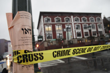 Crime scene in Crown Heights after a 2014 anti-Semitic hate crime. (AP Photo/Mark Lennihan)