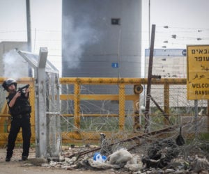 An Israeli policeman responding to previous Palestinian riots at Ofer Prison. (Photo by Flash90)