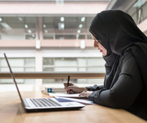 saudi woman working computer
