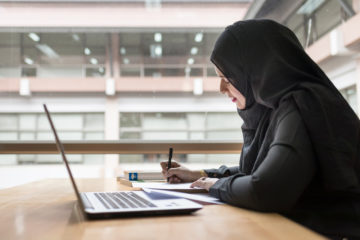 saudi woman working computer