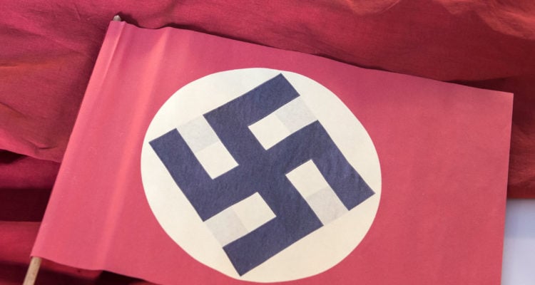 Milwaukee university student holds swastika sign in bid for publicity