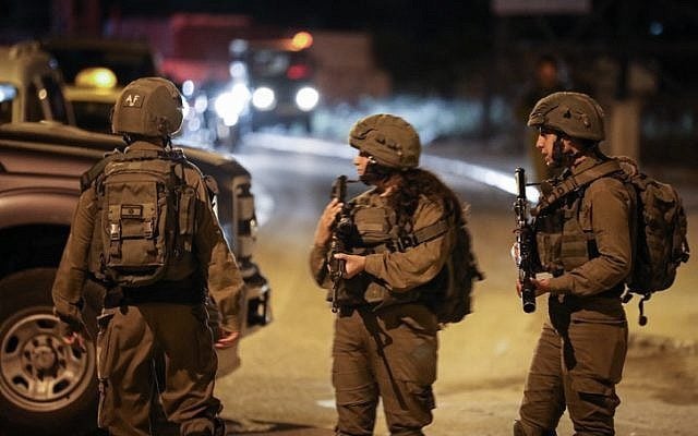 IDF arrests brothers, mother of Givat Assaf terrorist in early morning raid