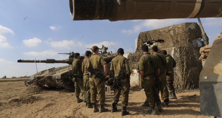 Israel moves two brigades to the Gaza Strip, calls up some reserves