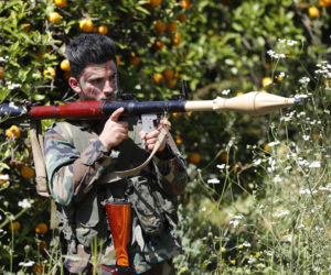 A Hezbollah terrorist with an RPG. (AP Photo/Hussein Malla)