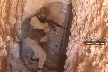 Syrian soldier raiding a tunnel in Homs provence. (Syrian Central Military Media, via AP)