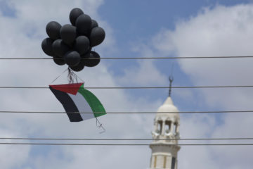Balloons with a Palestinian flag. (AP Photo/Nasser Nasser)