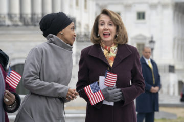 Rep. Ilhan Omar, D-Minn., left, joins Speaker of the House Nancy Pelosi, D-Calif. (AP Photo/J. Scott Applewhite)