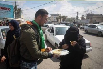 Palestinians in Gaza celebrate terror with sweets