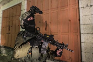 IDF soldiers conduct a search near Hebron. (Nati Shohat/Flash90)