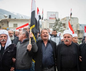 Druze community members protest Israeli sovereignty in the Golan Heights. (Basel Awidat/Flash90)