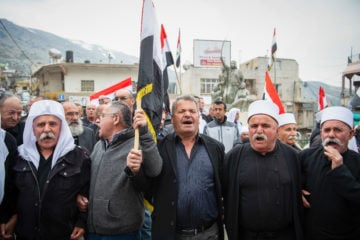 Druze community members protest Israeli sovereignty in the Golan Heights. (Basel Awidat/Flash90)