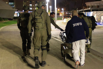 IDF soldiers evacuate a wounded Israel Prison Service guard to Soroka Hospital in Beersheba, March 24, 2019.