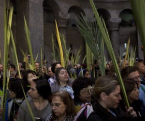 Christian worshippers on Palm Sunday in Jerusalem's Old City. (AP Photo/Oded Balilty)