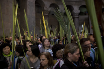 Christian worshippers on Palm Sunday in Jerusalem's Old City. (AP Photo/Oded Balilty)