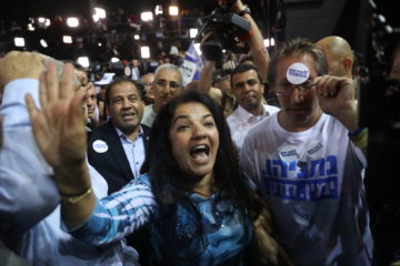 Likud supporters react to the first voting results in the Israeli elections. (Yonatan Sindel/FLASH90)