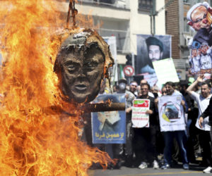 An effigy of Donald Trump set on fire at anti-Israel Al-Quds, Day rally in Iran in 2018. (AP Photo/Ebrahim Noroozi)