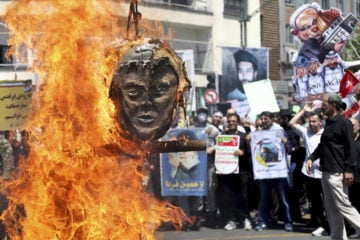 An effigy of Donald Trump set on fire at anti-Israel Al-Quds, Day rally in Iran in 2018. (AP Photo/Ebrahim Noroozi)