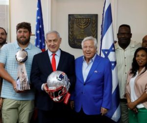 Benjamin Netanyahu with Patriots owner Robert Kraft and several players. (AP Photo/Sebastian Scheiner)