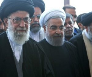 Ali_Khamenei_and_Hassan_Rouhani_in_funeral_of_Abbas_Vaez-Tabasi-880x495
