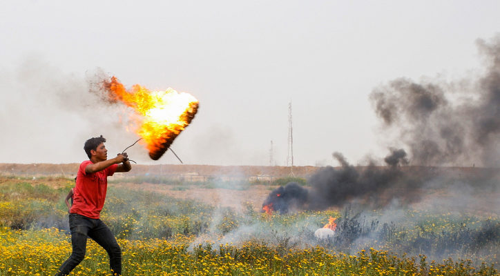 Palestinians throw explosives, hand grenades during Gaza border riots