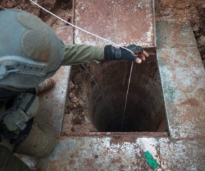 Israeli soldiers stand near a tunnel. (illustrative) (Flash90/Hadas Parush)