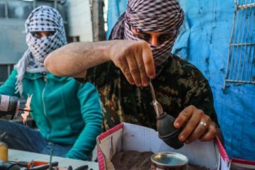 Palestinians making explosives. (Flash90/Abed Rahim Khatib )