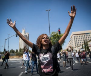 Ethiopians and supporters demonstrate against police violence and discrimination following the death of 19-year-old Ethiopian, Solomon Tekah.
